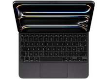 Charger l&#39;image dans la galerie, Un clavier gris foncé ouvert avec un trackpad. Il est sur une surface blanche. L&#39;écran est noir.
