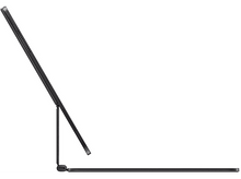 Charger l&#39;image dans la galerie, Vue latérale d&#39;une tablette noire ouverte sur un clavier noir. La tablette est inclinée vers le haut.
