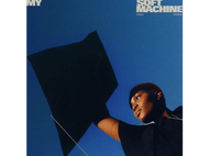 Pochette d'album : Arlo Parks tenant un cerf-volant contre un ciel bleu vif, regardant vers le haut.