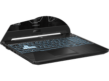 Charger l&#39;image dans la galerie, Ordinateur portable gaming ASUS TUF noir. Le clavier a un rétroéclairage bleu. Logo TUF sur le couvercle.
