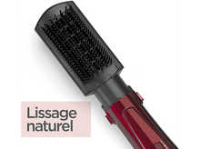 Charger l&#39;image dans la galerie, Une brosse lissante, rouge et noire, avec le texte &#39;Lissage naturel&#39; sur un fond rosé.
