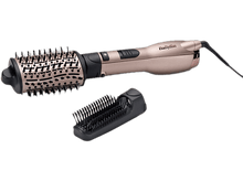 Charger l&#39;image dans la galerie, Une brosse à cheveux Babyliss or rose avec une poignée noire et un accessoire de brosse supplémentaire.
