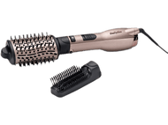 Une brosse à cheveux Babyliss or rose avec une poignée noire et un accessoire de brosse supplémentaire.