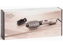 Charger l&#39;image dans la galerie, Boîte d&#39;un styler capillaire. Elle est étiquetée &quot;Volume Blow-Dry Secher&quot; et montre le styler et la brosse.

