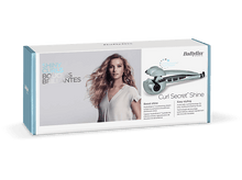 Charger l&#39;image dans la galerie, Boîte avec une femme sur le devant. La boîte contient un produit coiffant.
