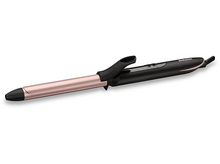 Charger l&#39;image dans la galerie, Un fer à friser avec un corps en or rose et une poignée noire.
