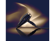 Charger l&#39;image dans la galerie, Un sèche-cheveux bleu foncé avec une buse dorée, reflété sur une surface contre un fond flou.
