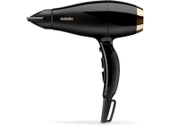 Un sèche-cheveux Babyliss noir et doré, gros plan sur fond noir.