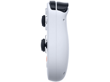 Charger l&#39;image dans la galerie, Une manette blanche pour une console de jeux. La manette possède des boutons et des joysticks.
