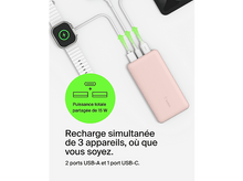 Charger l&#39;image dans la galerie, Batterie externe rose avec des câbles blancs connectés à une smartwatch et deux appareils.

