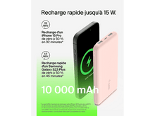 Charger l&#39;image dans la galerie, Un téléphone noir se rechargeant sur une batterie externe rose. L&#39;écran affiche un symbole de charge.

