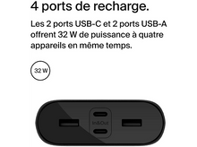 Charger l'image dans la galerie, Une batterie externe noire avec quatre ports de charge, avec les ports étiquetés 'In &amp; Out'.
