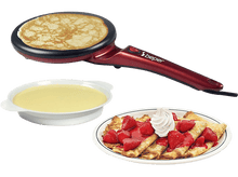 Charger l&#39;image dans la galerie, Crêpière avec une crêpe à l&#39;intérieur. Un bol avec de la crème et une assiette avec des crêpes et des fraises.
