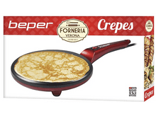 Charger l&#39;image dans la galerie, Une crêpière rouge avec une crêpe dessus, et une boîte montrant des crêpes.
