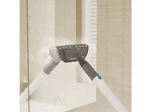 Charger l&#39;image dans la galerie, Un nettoyeur vapeur utilisé pour nettoyer une porte de douche en verre, créant de la vapeur et des gouttelettes.
