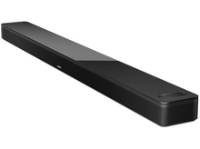 Charger l&#39;image dans la galerie, Barre de son noire sur fond blanc. Design élégant, rectangulaire avec dessus sombre et côtés en mesh.
