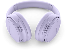 Charger l&#39;image dans la galerie, Une paire d&#39;écouteurs Bose violets clairs sur fond noir, vue d&#39;en haut.
