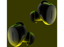 Charger l&#39;image dans la galerie, Écouteurs Bose noirs sur un fond dégradé jaune-vert.
