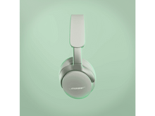 Charger l&#39;image dans la galerie, Casque Bose blanc, avec le nom de la marque visible, sur fond dégradé vert.
