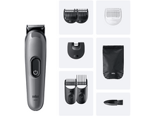 Charger l&#39;image dans la galerie, Une tondeuse à barbe Braun gris foncé avec divers accessoires.
