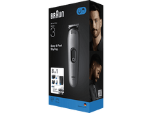 Charger l&#39;image dans la galerie, Boîte Braun All-in-One Series 3 avec la tondeuse et le visage d&#39;un homme. La boîte montre la tondeuse et les accessoires.
