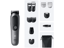 Charger l&#39;image dans la galerie, Une tondeuse Braun et divers accessoires. Sont inclus des peignes, une tête de tondeuse et une brosse de nettoyage.
