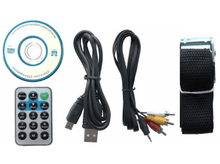 Charger l&#39;image dans la galerie, Divers composants électroniques comme une télécommande, des câbles et un disque.
