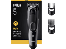 Charger l&#39;image dans la galerie, Tondeuse à cheveux noire Braun Série 5 avec deux accessoires et boîte du produit à gauche.
