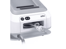 Charger l&#39;image dans la galerie, Un défroisseur de vêtements Braun blanc et gris avec une prise et un cordon enroulé.
