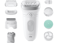 Épilateur blanc et accessoires. Comprend différentes têtes, une brosse et un sac, le tout sur fond noir.