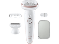 Rasoir électrique blanc et or rose. Les accessoires comprennent une brosse, un sac de rangement et diverses têtes de coupe.