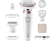 Un ensemble d'épilateur avec plusieurs accessoires, dont une brosse et une tête de rasage.