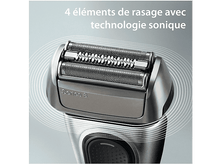 Charger l&#39;image dans la galerie, Gros plan sur un rasoir électrique. Le rasoir possède quatre éléments de rasage avec technologie sonique.
