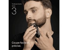 Charger l&#39;image dans la galerie, Un homme se rase la barbe avec un rasoir électrique noir. Le texte dit &#39;Série 3&#39;.
