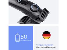 Charger l&#39;image dans la galerie, Rasoir électrique avec bouton d&#39;alimentation bleu et icône de batterie. Un drapeau allemand est également présent.
