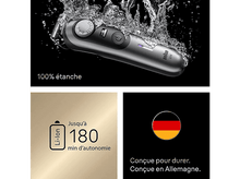 Charger l&#39;image dans la galerie, Rasoir argenté avec éclaboussures d&#39;eau, texte : 100% étanche, et icône de batterie.
