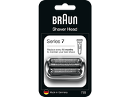 Tête de rasoir Braun Series 7 sur fond noir. Lames argentées et emballage.