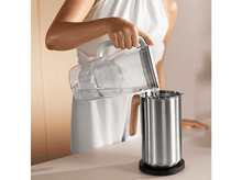 Charger l&#39;image dans la galerie, Un haut-parleur vertical avec un motif de grain de bois, avec un port de haut-parleur noir.
