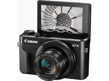 Charger l&#39;image dans la galerie, Appareil photo Canon, noir, écran ouvert, objectif pointé vers le spectateur.
