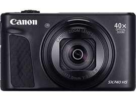Un appareil photo Canon noir. Il a un objectif zoom. Le texte sur l