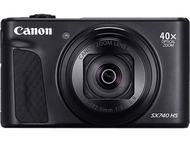 Un appareil photo Canon noir. Il a un objectif zoom. Le texte sur l'appareil photo indique Canon, 40X Optical Zoom et SX740 HS.