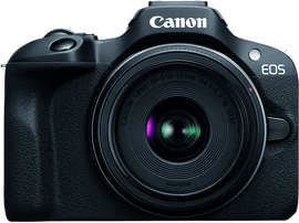 Un appareil photo Canon noir avec un objectif, sur fond noir.