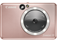 Appareil photo Canon Zoemini S2 or rose. Dispose d'un flash et d'un objectif rond. Anneau lumineux blanc.