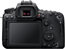 Charger l&#39;image dans la galerie, Dos d&#39;un appareil photo Canon DSLR noir avec boutons, écran et viseur. Sur une surface blanche.
