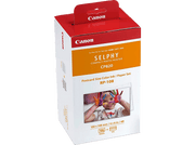 Boîte d'imprimante Canon Selphy avec les mains peintes d'un enfant.