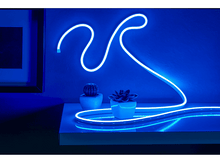 Charger l&#39;image dans la galerie, Une enseigne bleu néon avec deux plantes sur une étagère.
