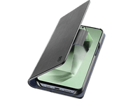 Téléphone dans un étui, ouvert. Téléphone noir, étui gris. Fond noir.