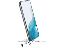 Charger l&#39;image dans la galerie, Un téléphone avec un protecteur d&#39;écran fissuré est appuyé sur une surface fissurée.
