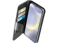 Étui de téléphone noir ouvert avec un smartphone à l'intérieur. Cartes dans les fentes, fond noir.