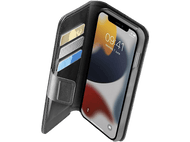 Étui de téléphone noir ouvert. Le téléphone est à l'intérieur et il y a des cartes de crédit dans l'étui.